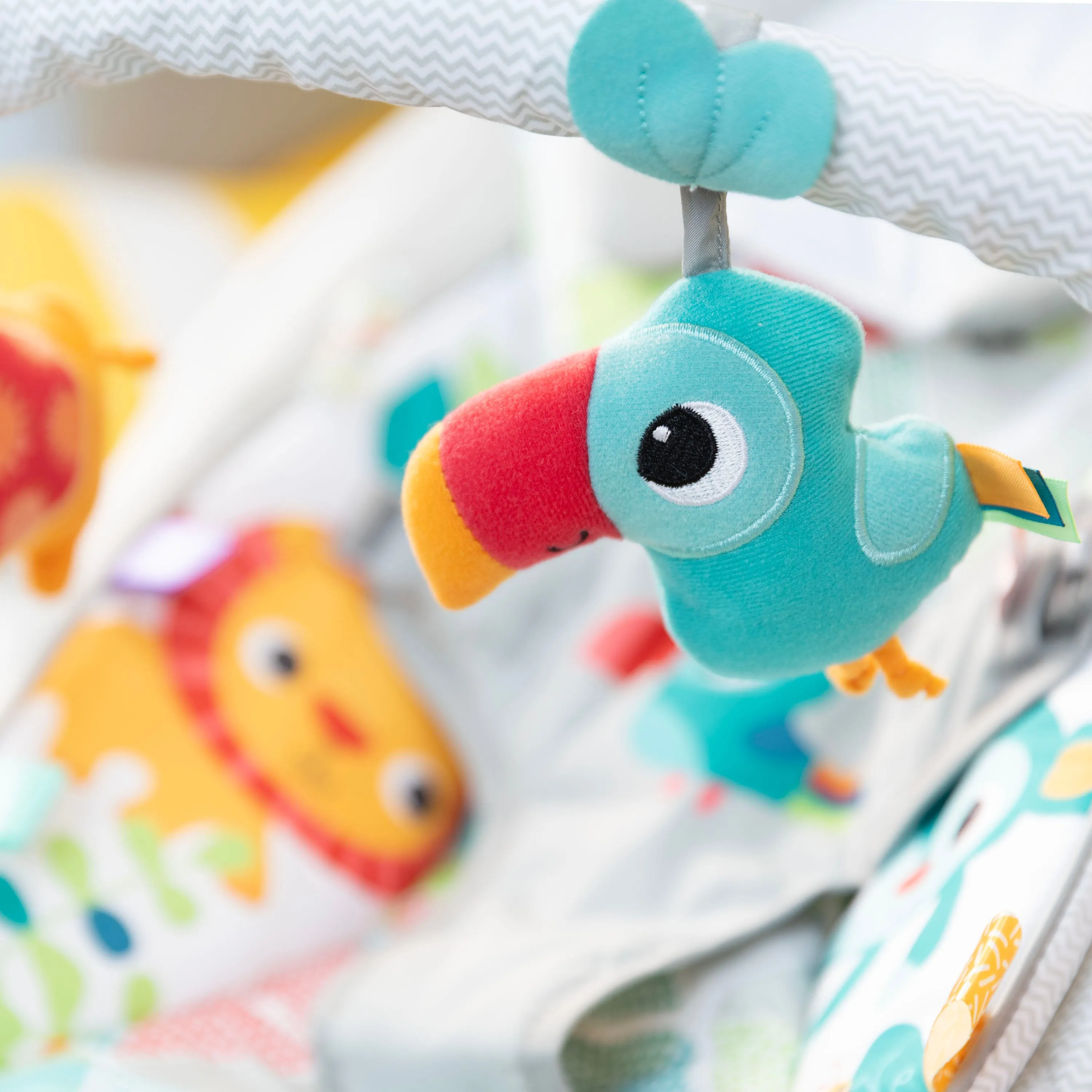 Bright Starts Toucan Tango Bouncer with Soothing Vibrations and Melodies